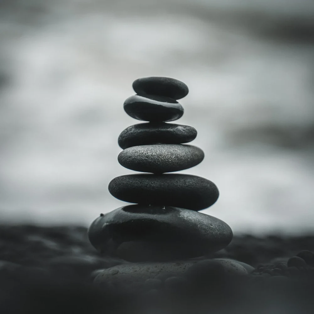 Stacked balancing stones representing the body's balance system